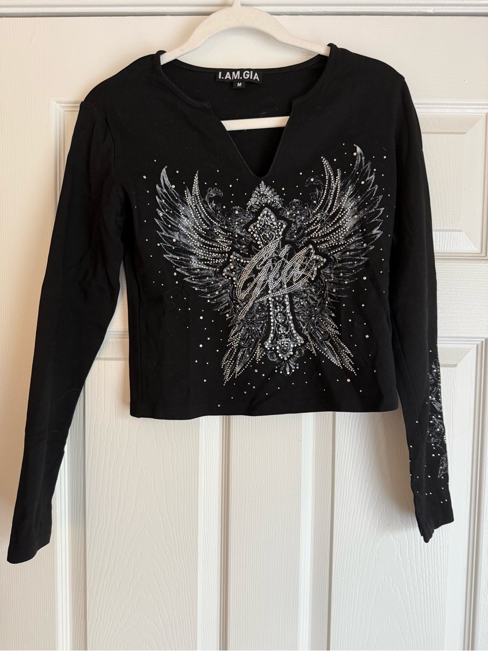 I.AM.GIA Black Long-Sleeve Crop Top with Silver Embellished Wing Graphic